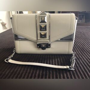 Elegant White and Silver Michael Kors Crossbody Handbag.
